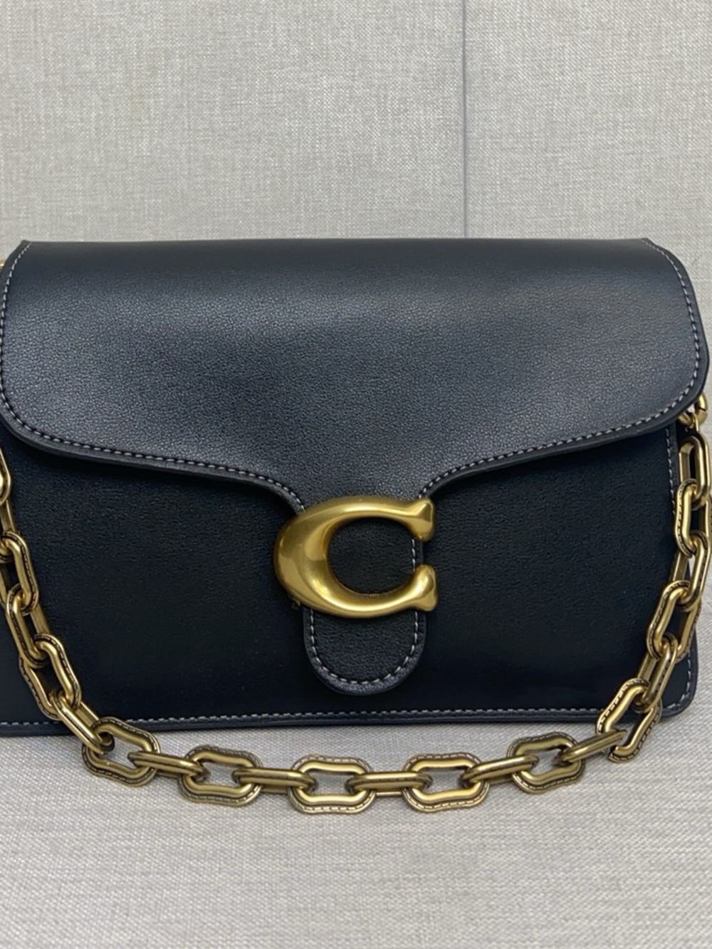 Classic Black Leather Shoulder Bag with Gold 'C' Accent